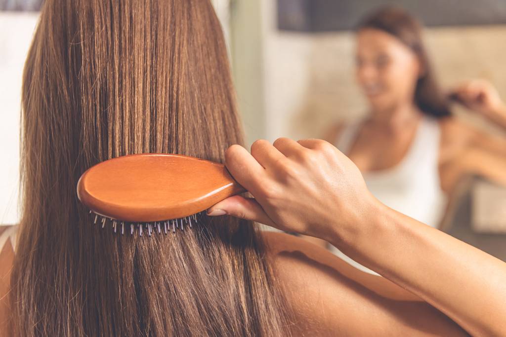Quatro dicas para encontrar a escova de cabelo perfeita para você