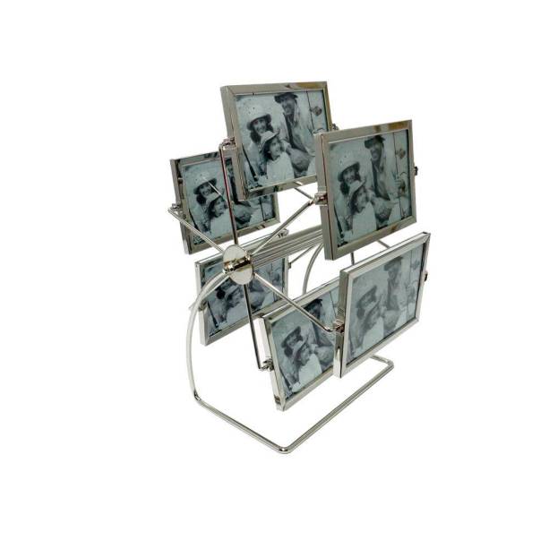 Porta-retrato giratório de alumínio, nas medidas  6 x 24 x 26 cm, com seis suportes dupla-face para fotos de 10 x 15 cm. <a href="https://www.americanas.com.br/produto/15113695/porta-retrato-aluminio-giratorio-gdxk5519?WT.srch=1&acc=e789ea56094489dffd798f86ff51c7a9&epar=bp_pl_00_go_mv_todas_geral_gmv&gclid=EAIaIQobChMIo8GxxY2j4QIVlISRCh3k_gSUEAkYASABEgIgyfD_BwE&i=573fe26beec3dfb1f8014408&o=57e5600deec3dfb1f8242784&opn=YSMESP&sellerId=14068763000189" target="_blank" rel="noopener">Americanas</a>, R$ 94,90