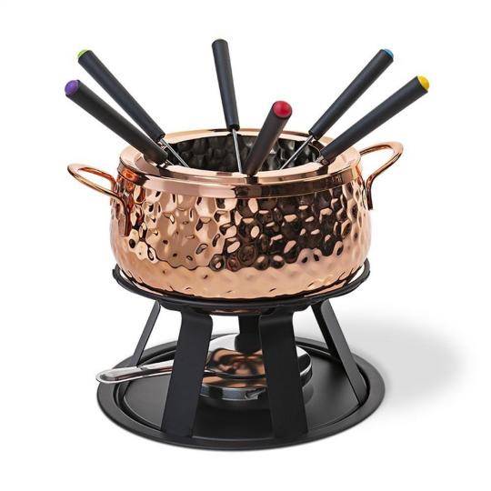 Conjunto para Fondue Brinox, com 11 pe&ccedil;as, de a&ccedil;o inox e panela revestida de cobre. <a href="https://www.americanas.com.br/produto/55872228/conjunto-para-fondue-brinox-11-pecas-em-aco-inox-revestido-cobre" target="_blank" rel="noopener">Americanas.com</a>, R$ 345,50