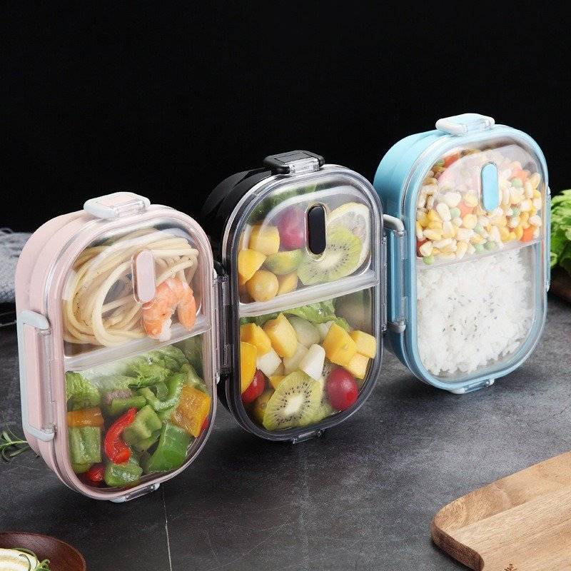Marmita Piquenique, de pl&aacute;stico e a&ccedil;o, com dois compartimentos. <a href="https://www.newchic.com/pt/saiclehome-lunch-boxes-7248/p-1421922.html?gmcCountry=BR&currency=BRL&createTmp=1&ID=516217&utm_source=googleshopping&utm_medium=shopping&utm_campaign=pla-hg-br-pc&utm_content=muna2&gclid=EAIaIQobChMIwrefj_OO4gIViAuRCh3m2Q1nEAQYAyABEgK7QPD_BwE" target="_blank" rel="noopener">New Chic</a>, R$ 66,53