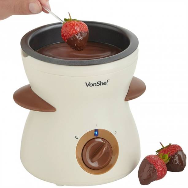 M&aacute;quina el&eacute;trica VonShef, com ajuste de temperatura, com 10 espetos e 10 garfos. <a href="https://www.comprafari.com/fondue-eletrico-vonshef/" target="_blank" rel="noopener">Comprafari</a>, R$ 486,90