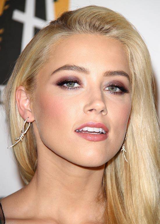 Amber Heard acusa Johnny Depp de violência doméstica