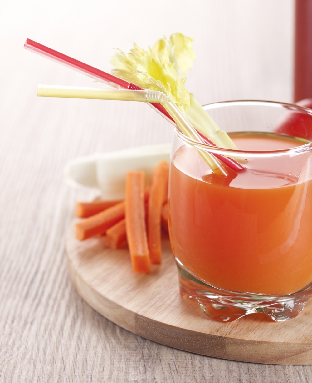 Suco de laranja, cenoura e maracuj&aacute; com gengibre