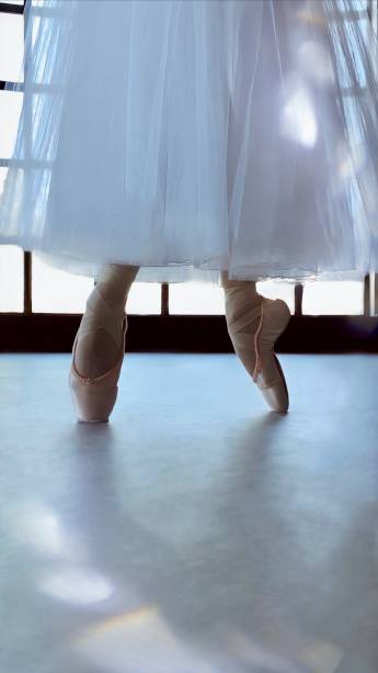 O detalhe das sapatilhas O detalhe das sapatilhas