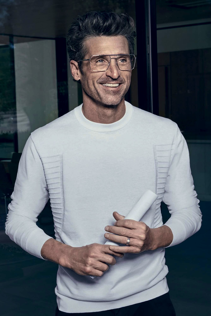 Patrick Dempsey de blusa de l&atilde; e &oacute;culos