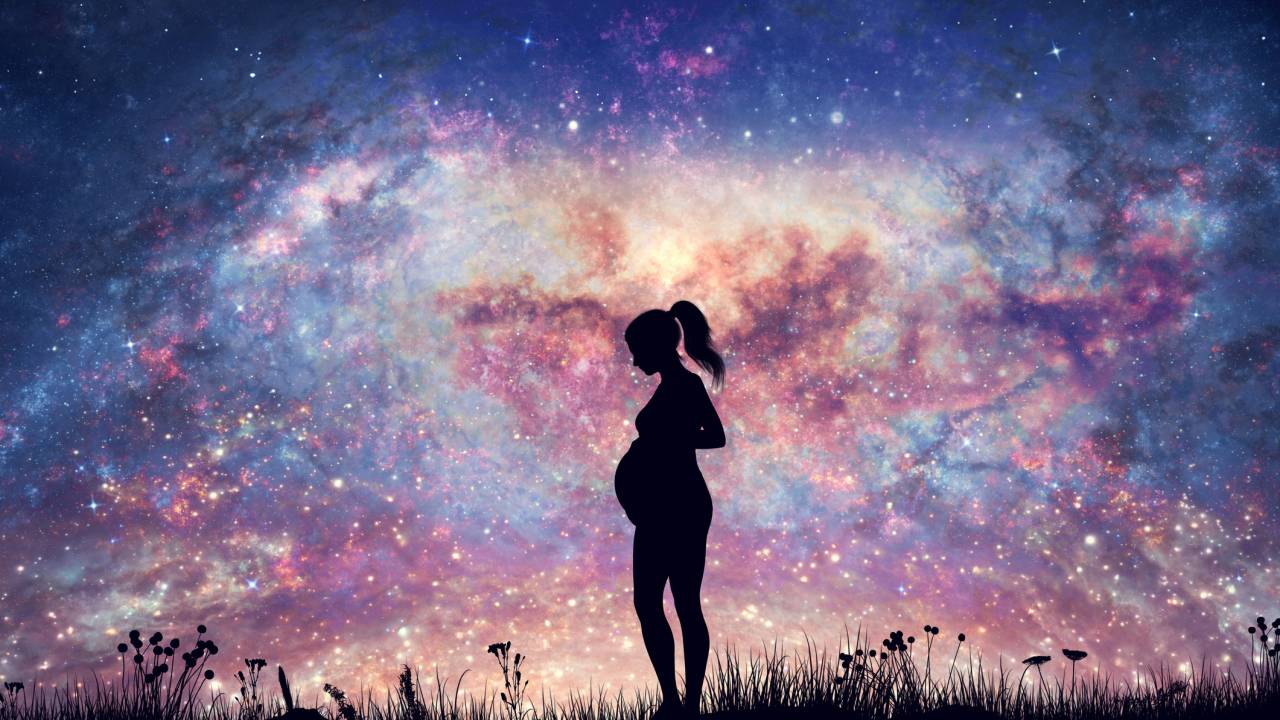 Pregnant woman expecting on night sky with nebula and stars. The miracle of parenthood. 3d render