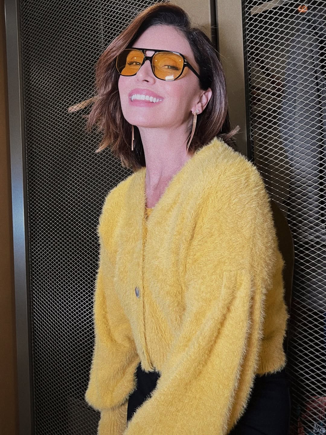 Imagem de Giovanna Antonelli com bob de franja longa para rostos redondos.