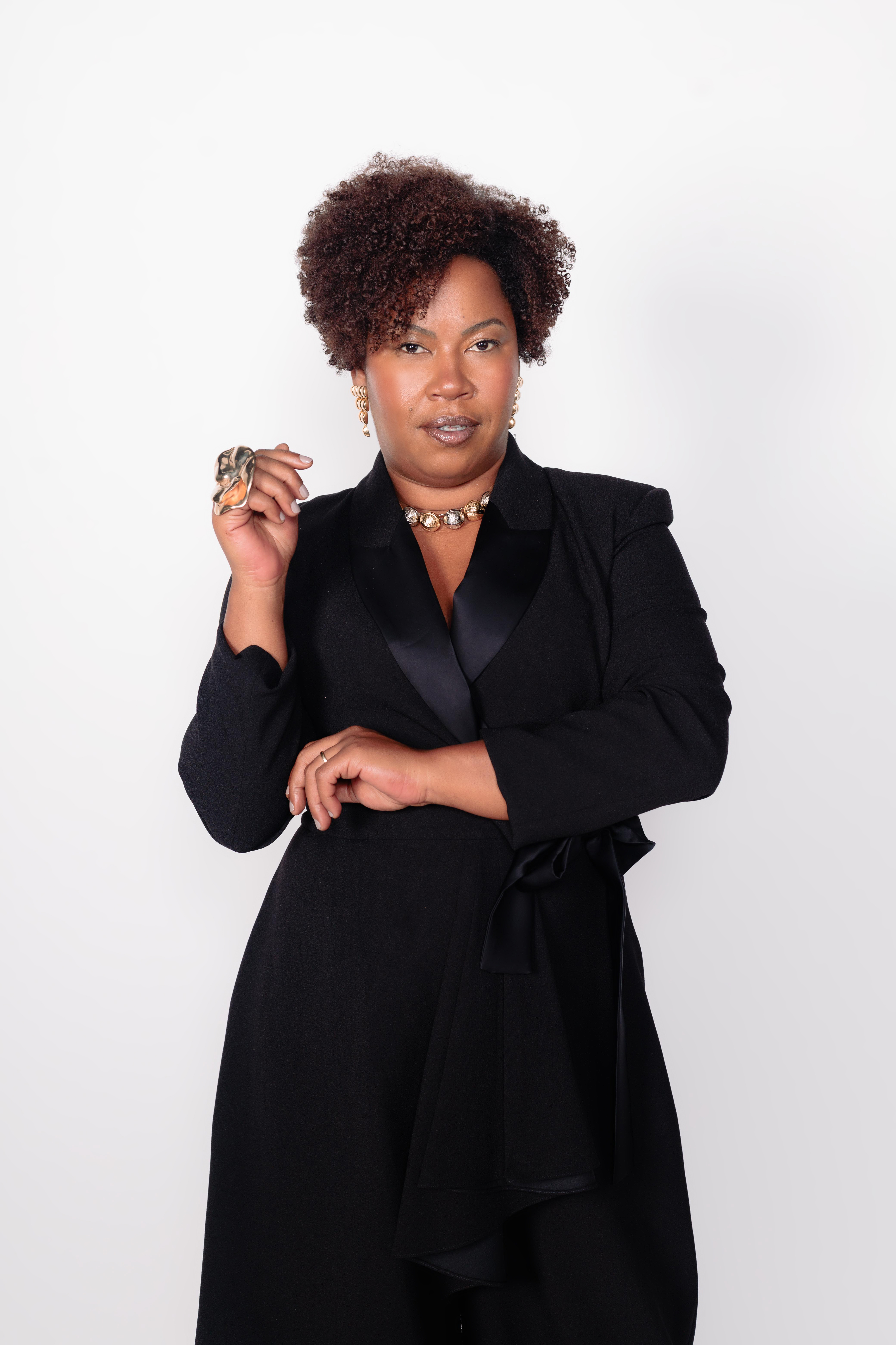 Imagem de Fayda Belo vista de frente representando mulheres negras na advocacia