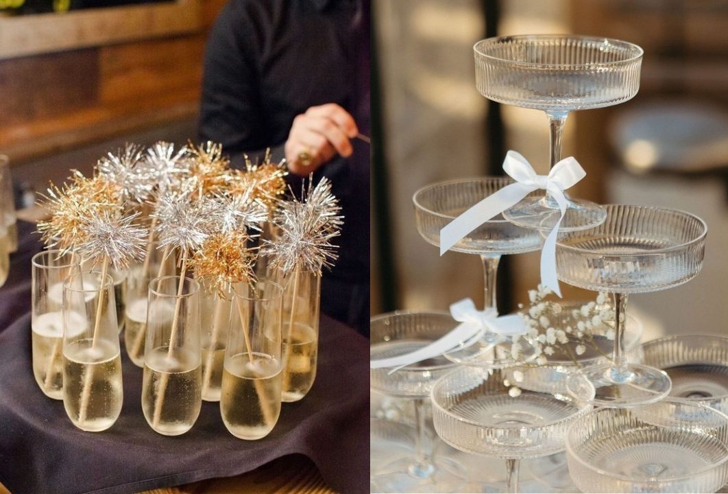 Ta&ccedil;as e copos com espumante decorados com ta&ccedil;as e enfeites de ano novo.