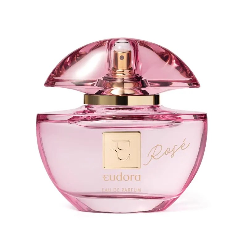 Frasco de perfume Eudora Ros&eacute; em vidro rosa transl&uacute;cido com tampa arredondada, fragr&acirc;ncia floral feminina com notas de frutas vermelhas e rosa, ideal para o ver&atilde;o.