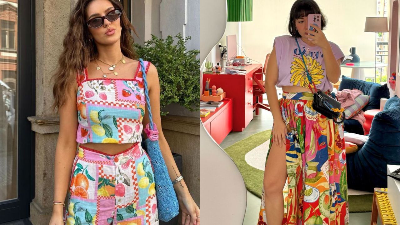 Conjunto cropped e short com estampa de frutas como lim&otilde;es, laranjas e cerejas, em padronagem colorida e divertida. Na imagem ao lado, saia longa estampada com frutas combinada a camiseta casual, criando um mix entre descontra&ccedil;&atilde;o e tropicalidade vibrante.