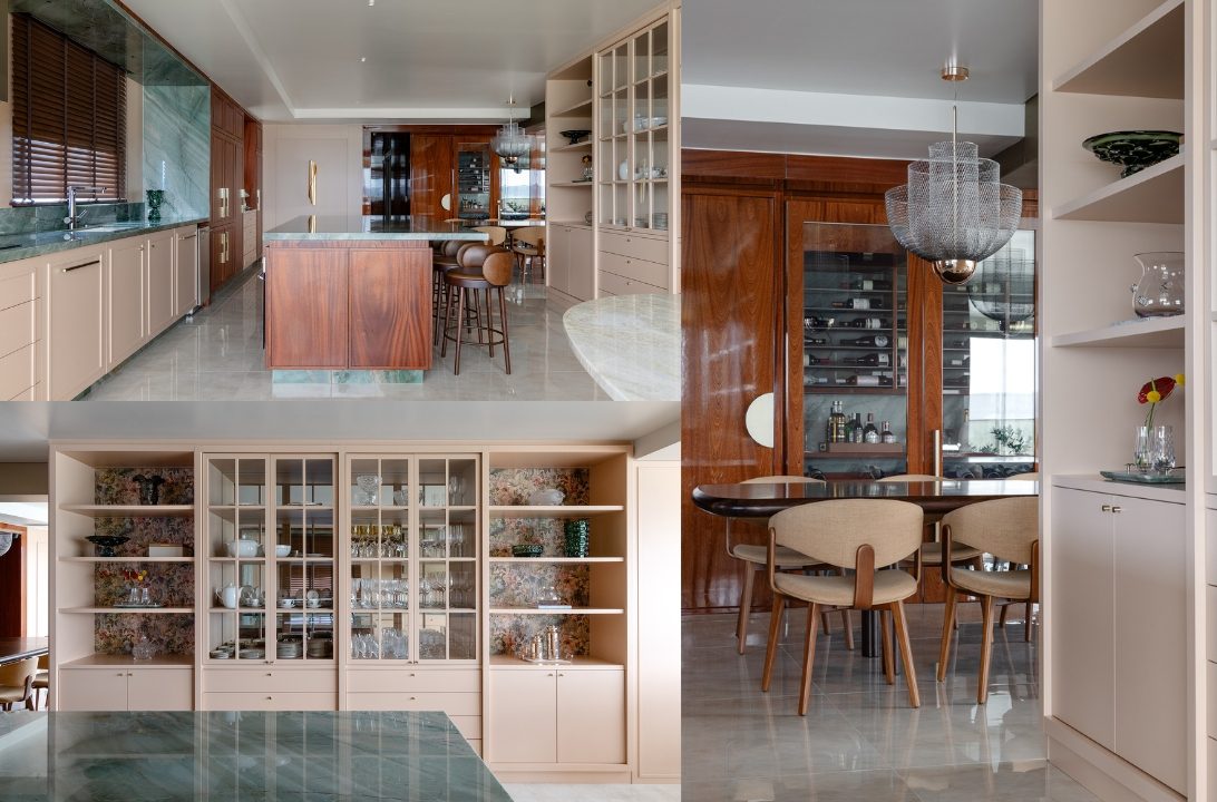 Cozinha com m&aacute;rmore verde integrada &agrave; sala de jantar e &agrave; adega.