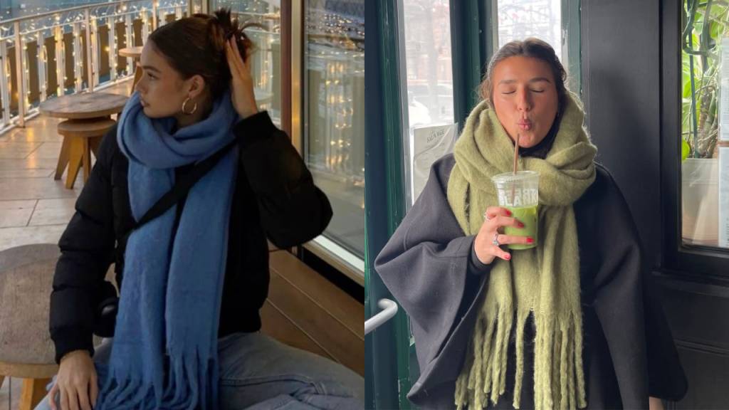 Duas mulheres usando cachec&oacute;is volumosos. &Agrave; esquerda, uma mulher de perfil com cachecol azul e jaqueta preta, sentada em um caf&eacute;. &Agrave; direita, outra mulher com cachecol verde-oliva, bebendo um smoothie verde com os l&aacute;bios franzidos
