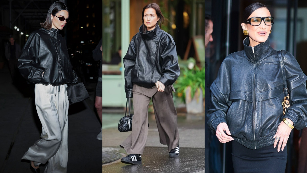 Três mulheres com jaquetas de couro pretas. Da esquerda para a direita: Kendall Jenner com óculos escuros e calça larga cinza; uma mulher de cabelo castanho com calça marrom e tênis; Bella Hadid com óculos e brincos dourados, bolsa de oncinha