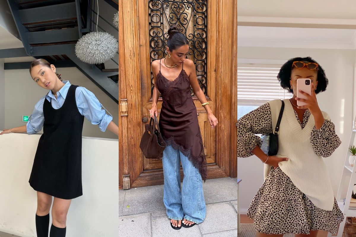 Três mulheres exibindo looks de moda. À esquerda, uma mulher asiática com vestido preto sobre camisa azul e meias pretas. Ao centro, uma mulher com vestido de seda marrom sobre calça jeans larga e sandálias. À direita, uma mulher negra com vestido estampado de oncinha e colete de tricô creme, tirando uma selfie