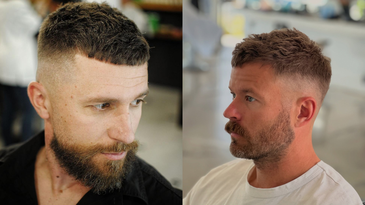 Dois homens brancos com barba e cabelo curto, um à esquerda com camisa preta e outro à direita com camiseta branca, ambos com corte degradê