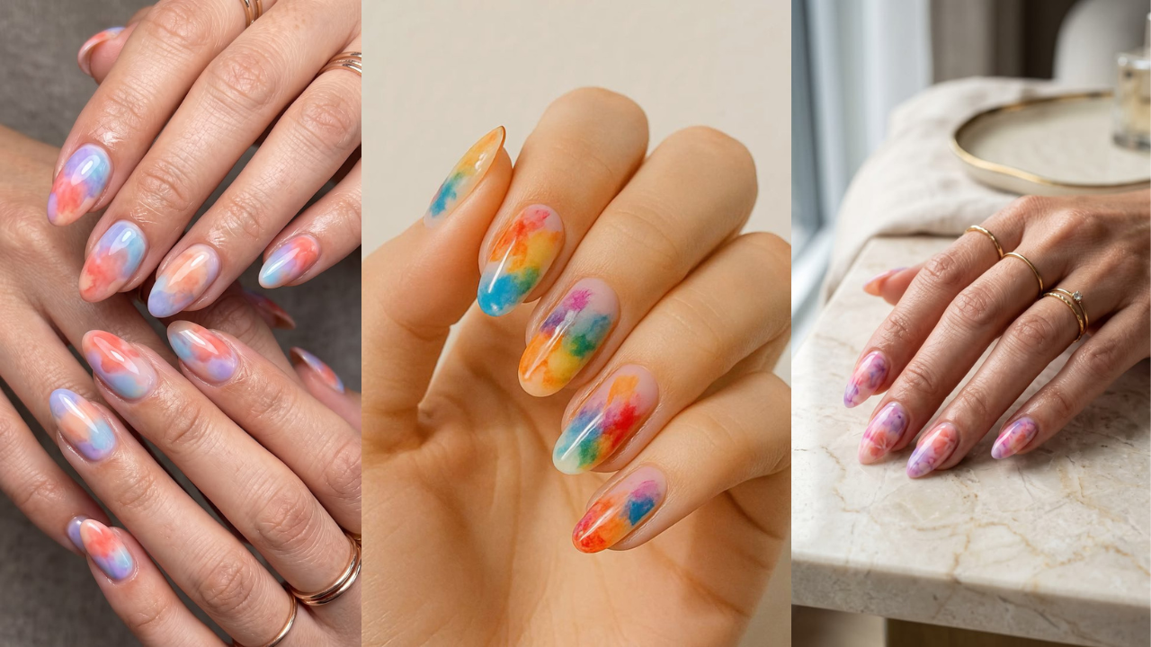 Três fotos de mãos femininas com unhas ovais decoradas. Na primeira, as unhas têm tons pastel de azul, laranja e roxo. Na segunda, as unhas exibem cores vibrantes como azul, verde, amarelo, laranja e vermelho. Na terceira, as unhas são decoradas com tons de rosa e roxo, e a mão usa anéis dourados sobre uma superfície de mármore